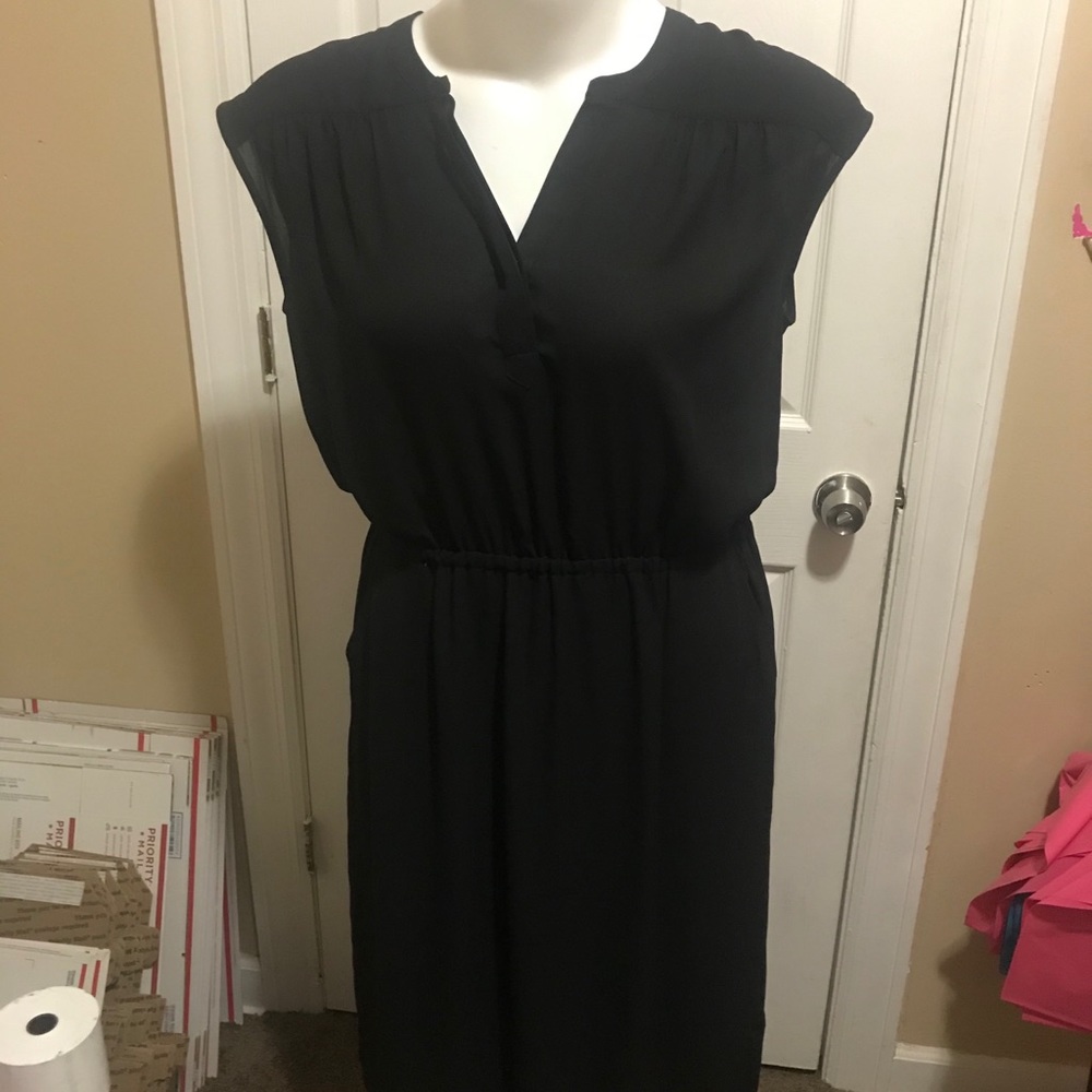 Black dress. Like new. No tags. Large.